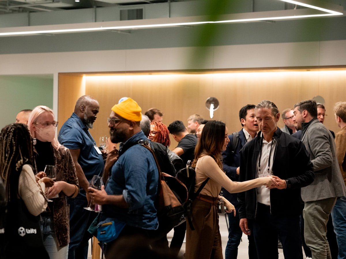 Members, professionals, and partners in conversation at an Academy gathering